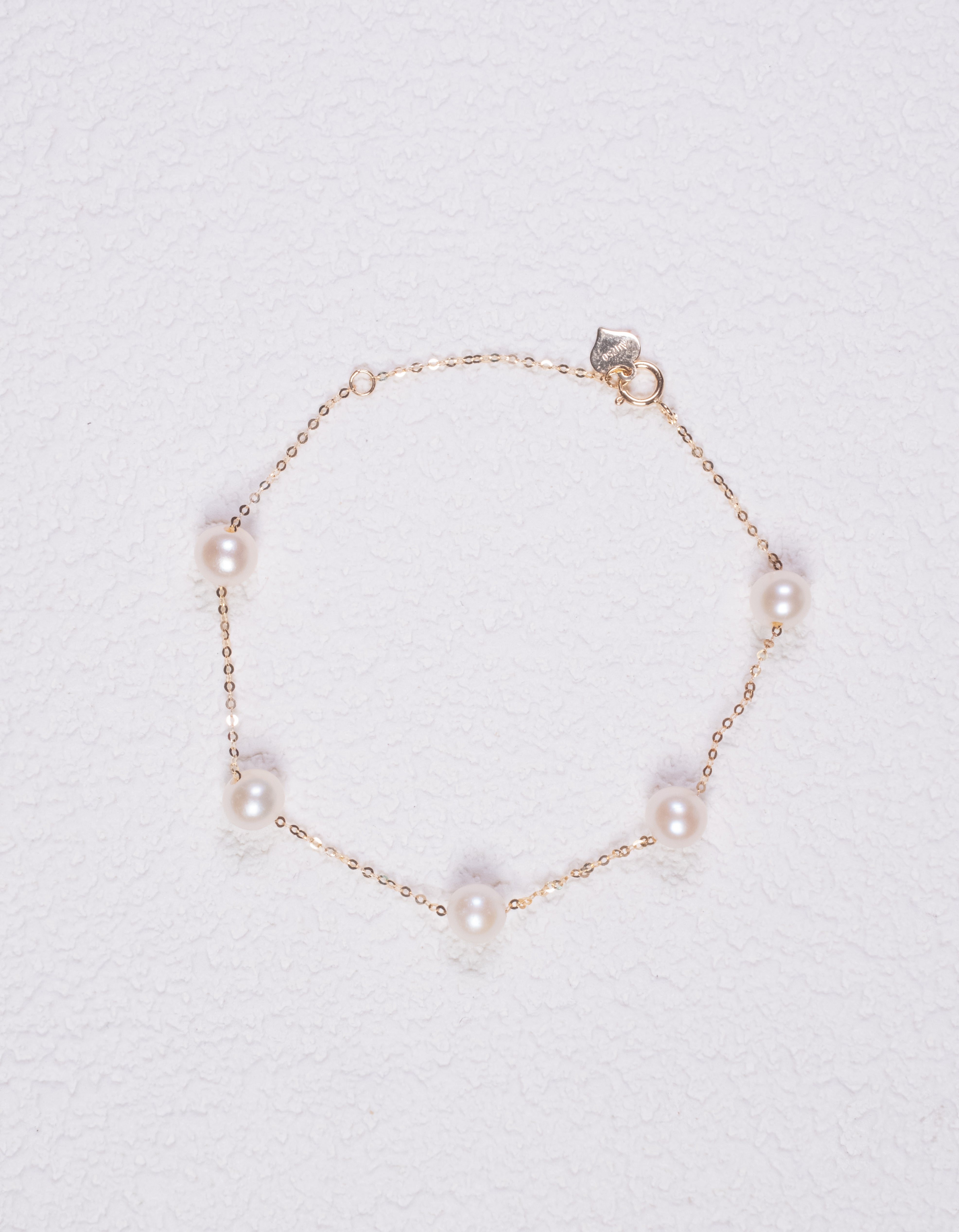 Rhea Pearl Station Bracelets